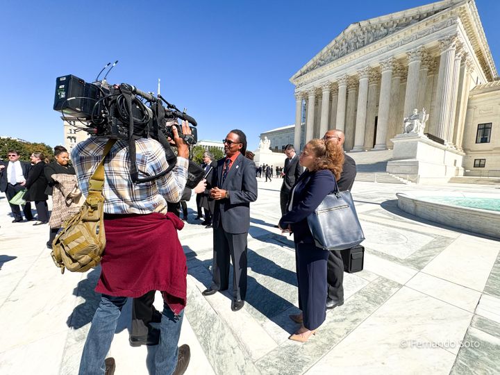 Taiwan Scott from Hilton Head and LDF Senior Counsel Leah Aden speak to reporters outside of the US Supreme Court 