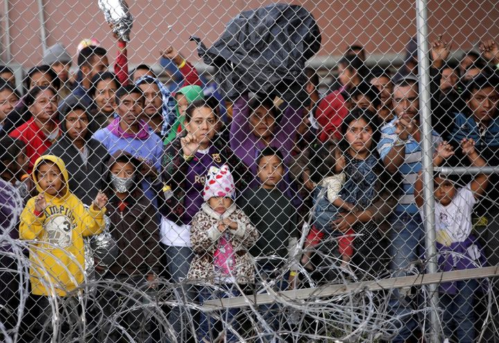 Central American migrants are seen inside an enclosure where they are being held by U.S. Customs and Border Protection (CBP),